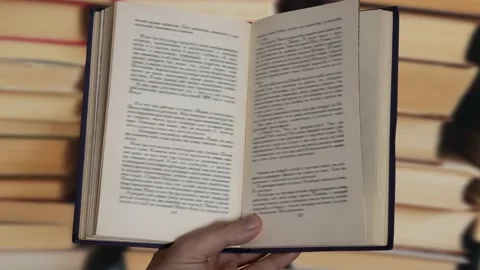 Animation of books in a hand Stock Footage 233564387