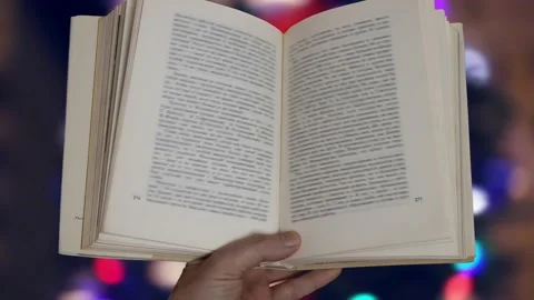 Animation of books in a hand Stockbeeldmateriaal 233564513