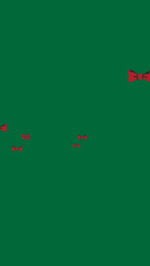 Animation of bow ties floating over green background Stock Footage 319882752