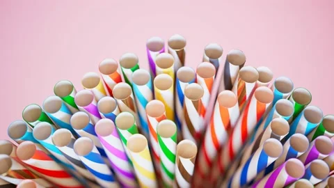Animation of a bunch of drinking straws in the cup.Zooming out colourful straws. Stock Footage 133472042