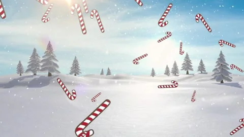 Animation of candy cane icons and snow falling over trees on winter landscape Stock Footage 220898259