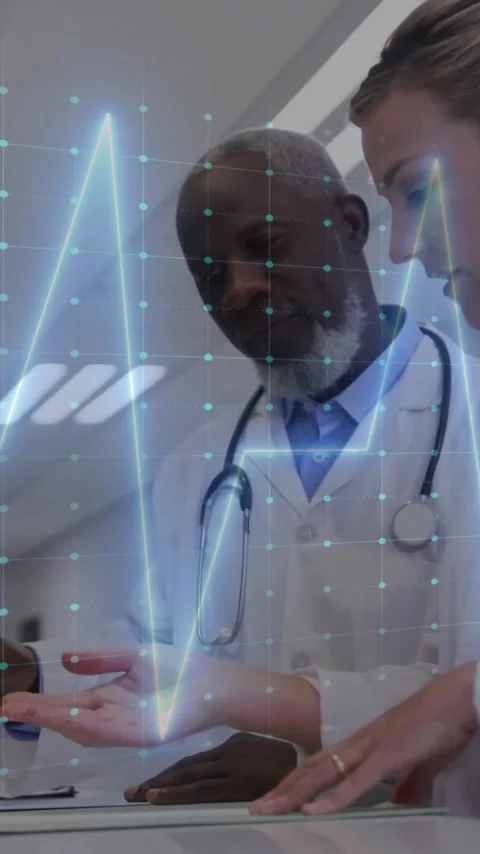 Animation of cardiograph over diverse doctors talking Stock Footage 344679879