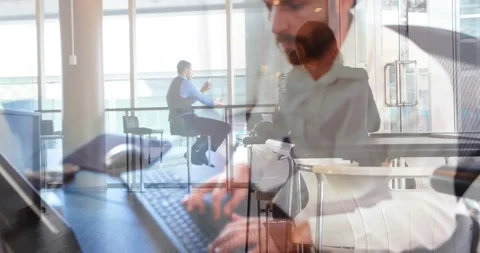Animation of caucasian man using computer over business people in office Video stock 172273047