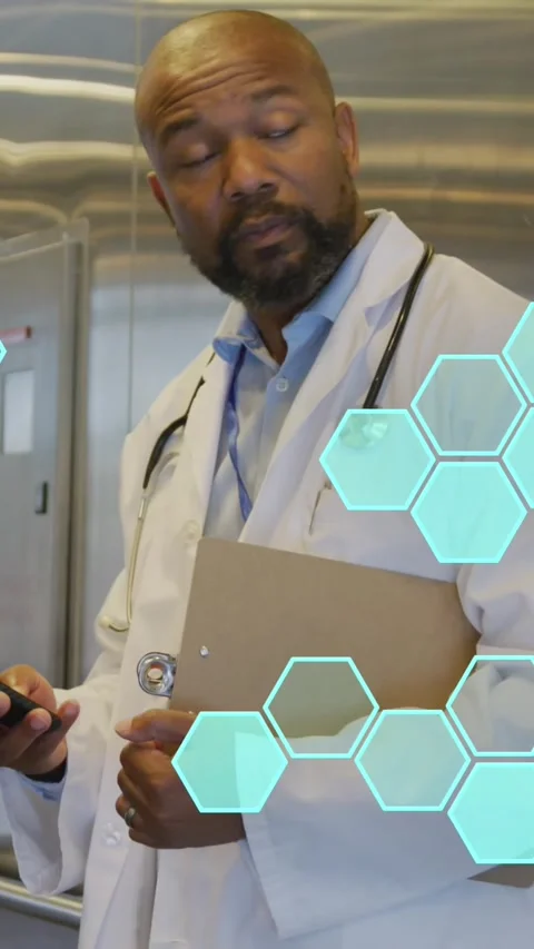 Animation of cell structures processing data over african american male doctor Stock Footage 343498793