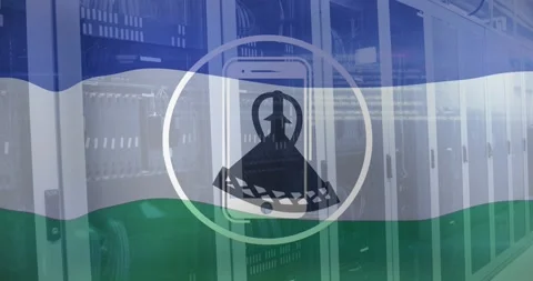 Animation of cellphone in circle flag of lesotho over computer language on data Stock Footage 328589011