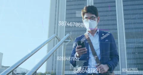 Animation of changing numbers against asian man wearing face mask climbing down Stock Footage 327899493