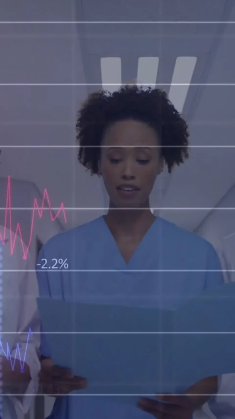Animation changing numbers, diverse doctors discussing patient reports while Stock Footage 343082767