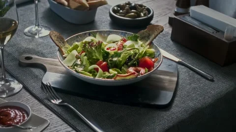 Animation of changing plates with ready food from chef on set table Stock Footage 314577382