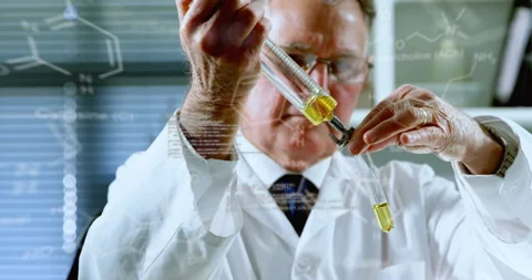 Animation of chemical formula and data processing over caucasian male scientist Stock Footage 310765931