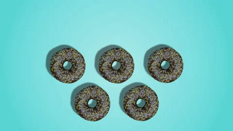 Animation of chocolate glazed donuts appears on cyan (blue) abstract background Stock Footage 195985183