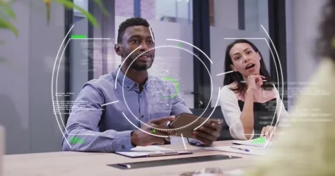 Animation of circles and computer language over diverse entrepreneurs discussing Stock Footage 330594155
