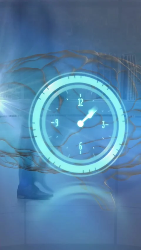 Animation of clock moving fast over man using computer Stock Footage 322210079
