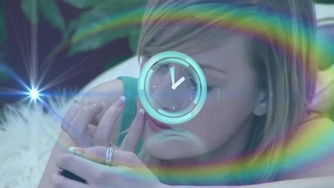 Animation of clock moving over caucasian woman doing make up Stock-Footage 328311354
