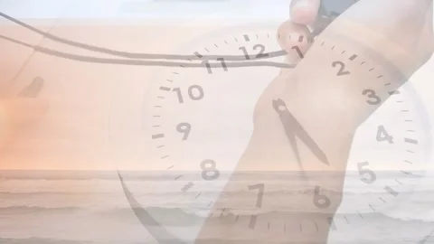Animation of clock moving over hands and sea on white background Stock Footage 328083235