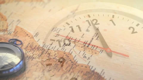 Animation of clock with moving seconds hand over compass on moving world map Stock Footage 329696952