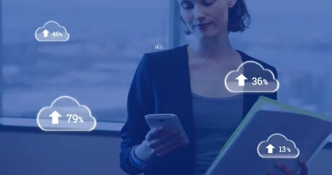 Animation of cloud symbols uploading data over happy caucasian businesswoman Stock Footage 327782341
