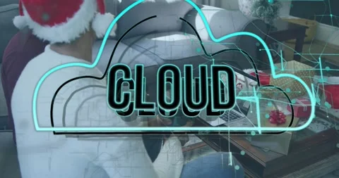 Animation of cloud text and data processing over caucasian man using laptop at Stock Footage 328413116