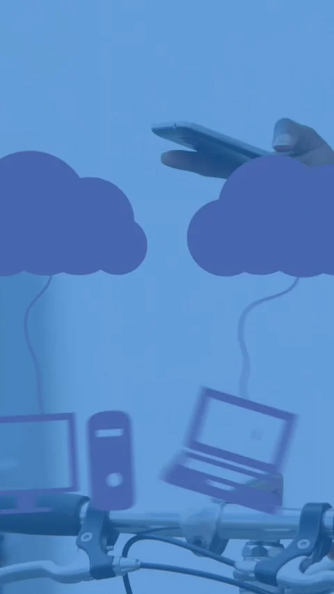 Animation of clouds with electronic devices over caucasian man using smartphone Stock Footage 344693729