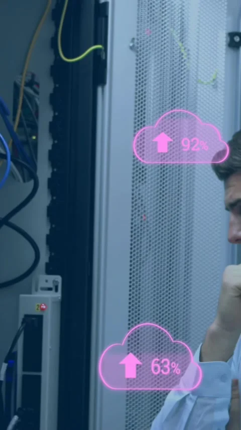 Animation of clouds with uploading over caucasian man checking servers Stock Footage 341991239