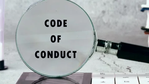 Animation of the CODE OF CONDUCT concept words through a magnifying glass in Stock-Footage 315357347