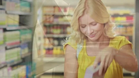 Animation of cogs and wind turbine over caucasian woman shopping Stock-Footage 330662022