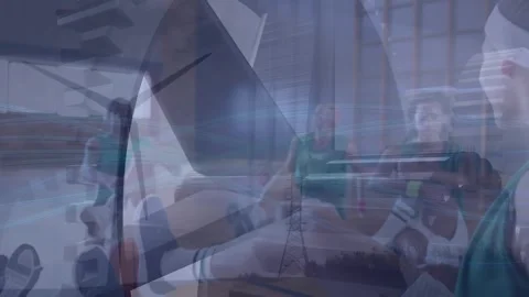 Animation of cogs moving over diverse female basketball players at gym Stock Footage 327784849