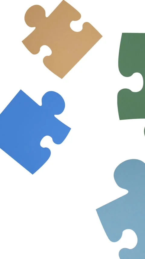 Animation of colourful pieces of puzzle falling on white background Stock Footage 344284977