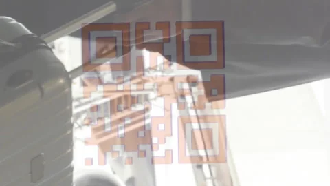 Animation of a colourful QR code in loop over man carrying his suitcase Stock Footage 312351372