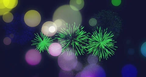 Animation of colourful spots of light over green fireworks exploding in night 動画素材 328290259