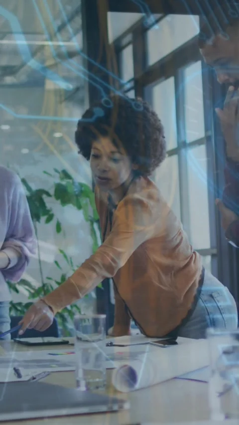 Animation of computer circuit board over diverse business people at office Stock Footage 343128515