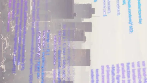 Animation of computer code overlaying city skyline, blending technology and Stock Footage 313523397