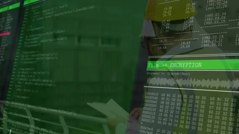 Animation of computer code overlaying person working on laptop in office Stock Footage 303840262