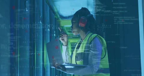 Animation of computer language, african american female engineer checking server Stock-Footage 247967202