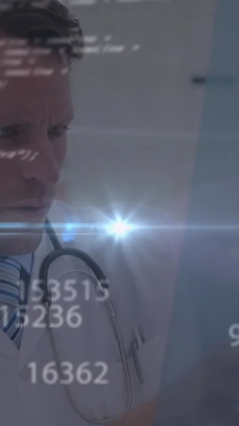 Animation of computer language and changing numbers over caucasian doctor Stock Footage 344614382