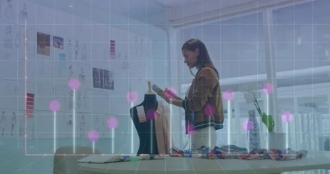 Animation of computer language and graph on biracial female designer checking Stock Footage 229436379