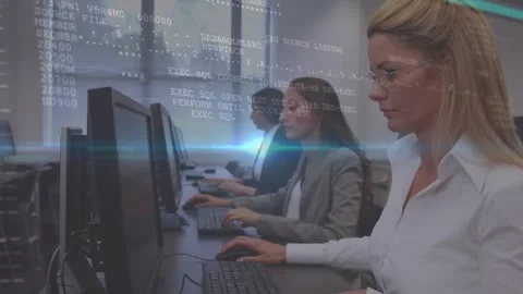 Animation of computer language and lens flares over diverse women working on Stock Footage 329223436