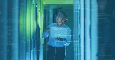 Animation of computer language, binary codes, african american male engineer Stock Footage 247967200