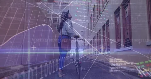 Animation of computer language, binary codes, trading boards, biracial woman Stock Footage 253455129