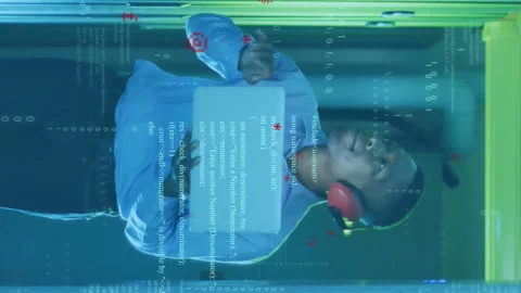 Animation of computer language, binary codes, african american male engineer Stock Footage 312489067