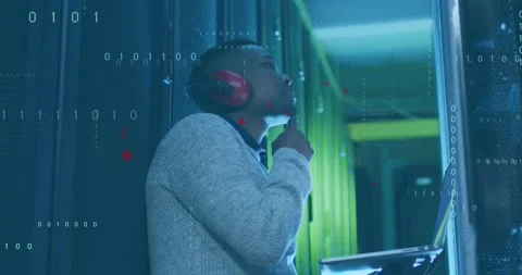 Animation of computer language, binary codes, african american man checking Stock Footage 330339011