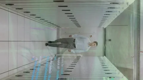 Animation of computer language, caucasian man looking at server racks while Stock Footage 313087715