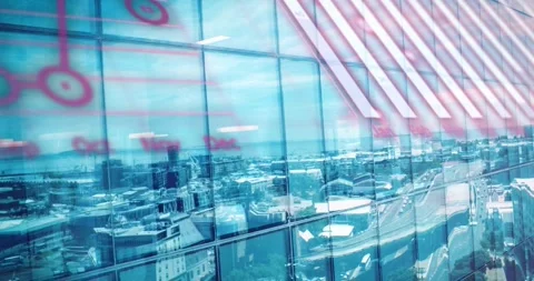 Animation of computer language, globe, graphs over aerial view of cityscape Stock Footage 325702540