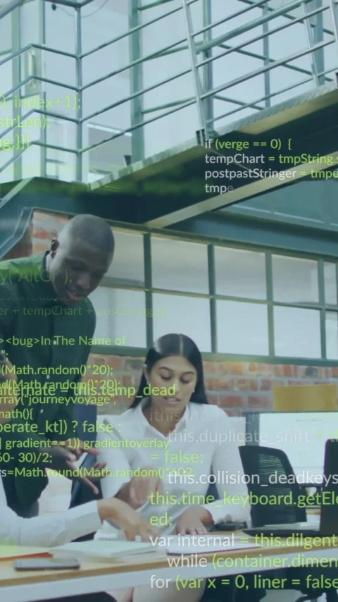 Animation of computer language over diverse coworkers discussing reports on Stock Footage 323578847