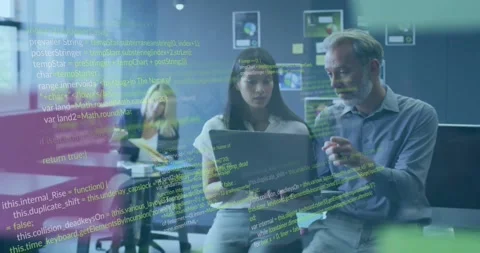 Animation of computer language over diverse coworkers discussing reports on Stock Footage 329511674
