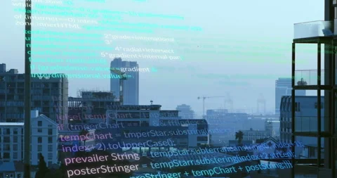Animation of computer language over modern buildings in background Stock Footage 310978074