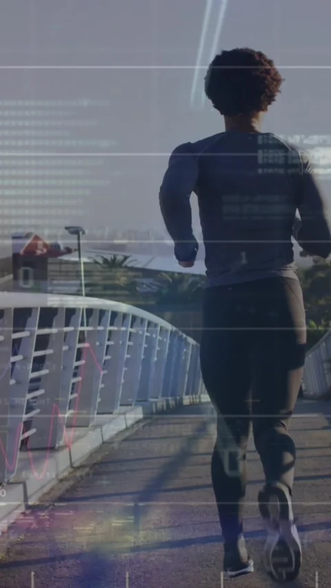 Animation of computer language over rear view of african american man running on Stock Footage 343739456