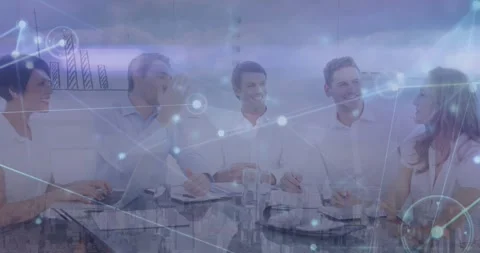 Animation of connected dots, aerial view of cityscape, diverse coworkers shaking Video stock 328299594