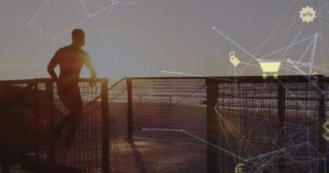 Animation of connected icons globe over silhouette on man running up stairs at Stock Footage 330771836