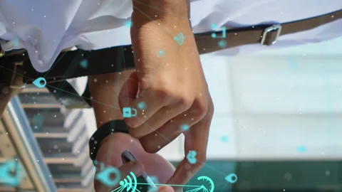 Animation of connected icons globes over midsection of man scrolling on Stock Footage 312847446