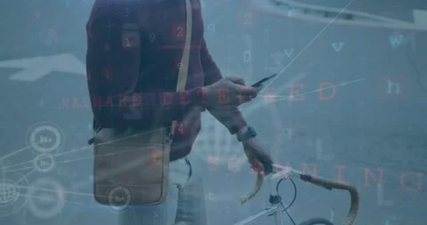 Animation of connected icons over african american holding bicycle and using Stock Footage 330780176